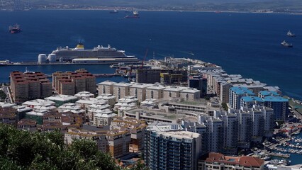 Cruise Ship Docking in Gibraltar Harbor with City Buildings in the Foreground