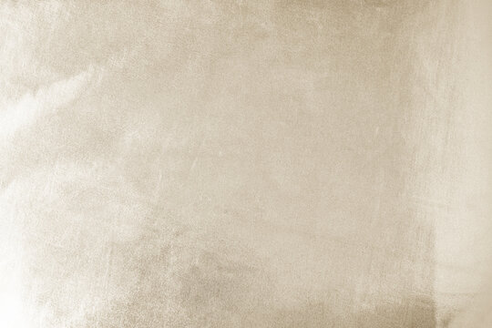 Fototapeta Light soft pale pastel brown golden beige nude white abstract background. Shiny silk fabric. Metallic shine. Light reflection. Disign.
