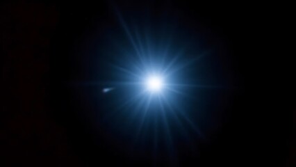 Obraz premium Bright Starburst, Glowing Light Rays, Blue Celestial Flare