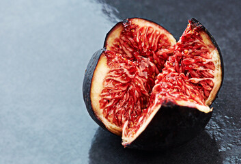 Healthy food, fruit and fig for balanced diet, nutrition and natural source of vitamin A. Vegan, option and organic produce on kitchen countertop for meal, snack and weight on gray background