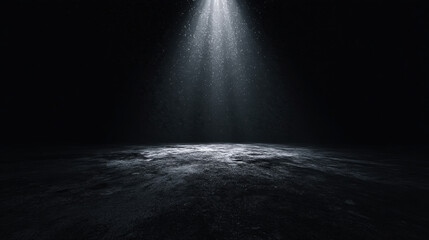 A dimly lit scene featuring a dark surface illuminated by a beam of light, creating a serene and mysterious atmosphere.