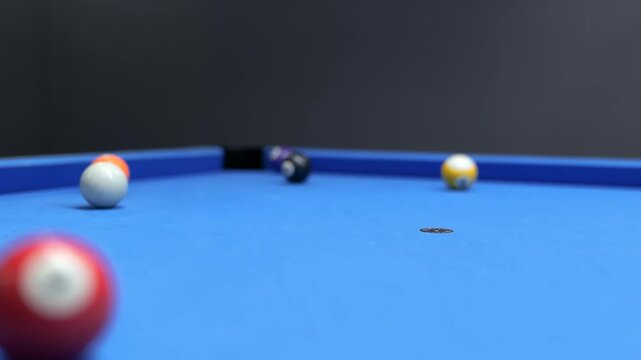 Breaking racked pool balls in eight-ball on billiard table. Classic american billiard game leisure activity in sport club. High quality 4k 10bit footage