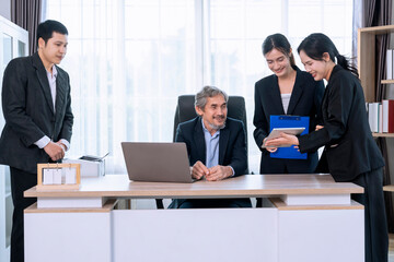 cheerful senior boss during business meeting,employees having conference in boardroom,conversation,consulting,discussing