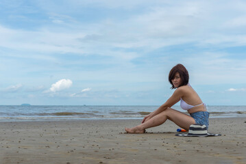 Asia happy Summer vacations Lifestyle woman relax and chill on beach background and Lifestyle and Travel Concept.