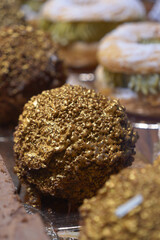 Exquisite dessert with golden decoration at a festive market