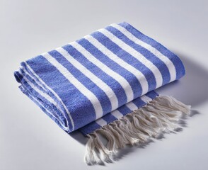 Folded Striped Beach Towel with Fringes for Vacation or Bathroom