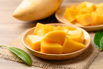 Cube mango on wooden plate ready to eating, Tropical fruit in summer season