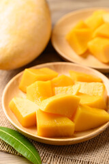 Cube mango on wooden plate ready to eating, Tropical fruit in summer season