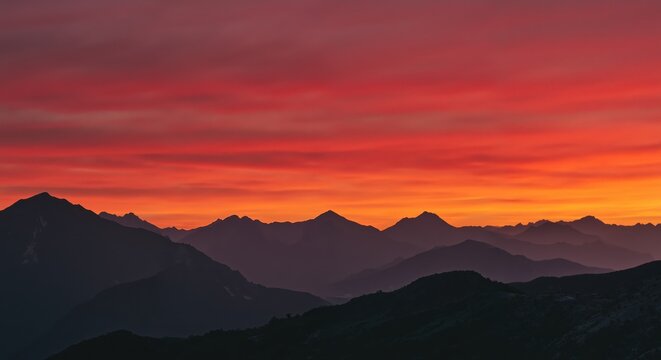 Majestic mountain landscape at sunset with colorful sky  