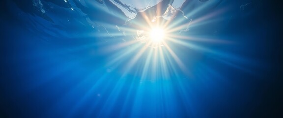 Sunbeams pierce deep blue water, illuminating mysterious underwater scene,  sunlight, abyss