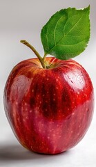 Fresh Red Apple with Green Leaf Close Up Still Life