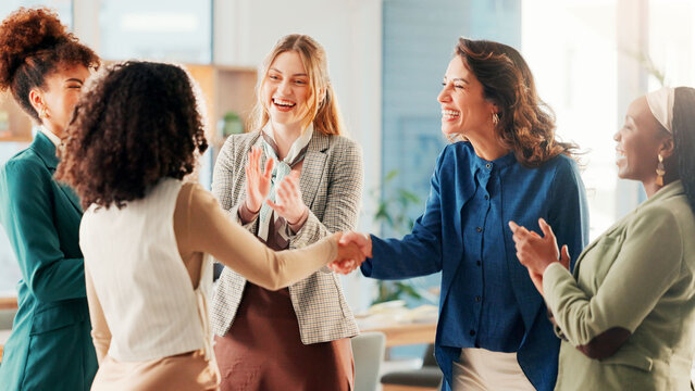 Happy women, handshake and meeting with applause for congratulations, greeting or introduction at office. Female people, colleagues or shaking hands with smile for agreement, winning or success