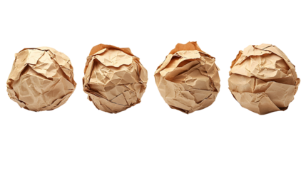 crumpled brown paper balls on white background