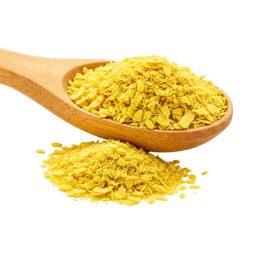 Nutritional yeast pile (deactivated yeast) in wooden spoon isolated on white, side view
