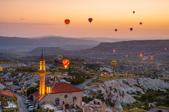 Hot air balloons and mosque, Cappadocia, Turkey