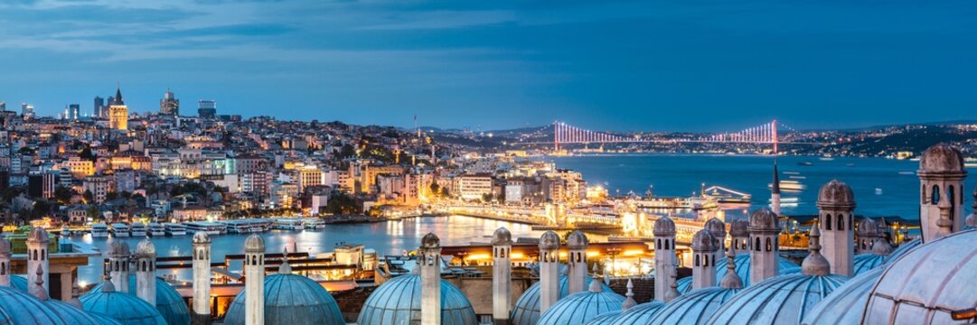 Panoramic of city and Bosforus at night, Istanbul, Turkey