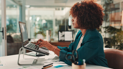 Creative, woman or laptop for social media campaign, trends or ads design in office. Technology,...