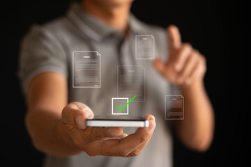 Digital checklist Businessman using mobile phone to check document list Approval process