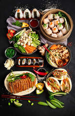 Big Assortment of Delicious asian foods.