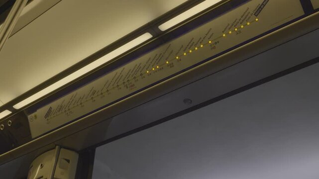 Traveling on the Paris subway, a close-up shot of the route indicator with glowing lights