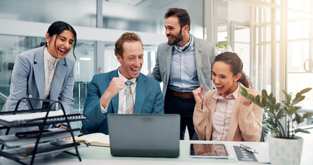 Fist pump, excited and business people on laptop in office with good news, success and victory....