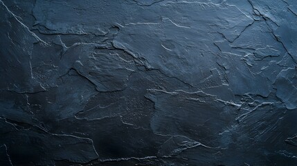 Dark blue stone texture background. Perfect for design projects needing a rough, textured backdrop.