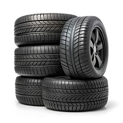 a stack of four black tires against a white background