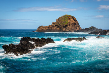 Landscape with natural volcanic formation pools on the coast of Porto Moniz in Madeira island, Portugal
