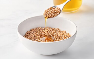 Sesame Seeds and Oil in White Bowl