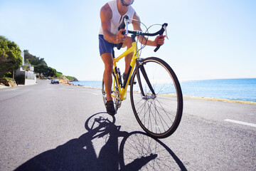 Cycling, road and sports person on bicycle travel, morning trip or journey for outdoor fitness, exercise or workout. Motion, body and athlete on carbon neutral bike, active hobby or training for race