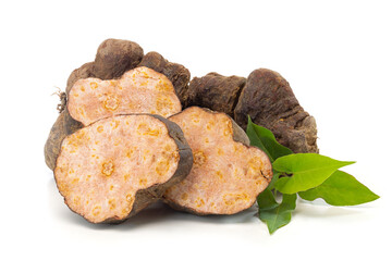 Chinese herbal medicine Polygonum Multiflorum (He Shou Wu) roots with leaves on white background.