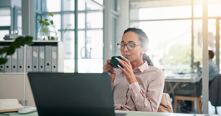 Office, business woman and laptop with coffee to drink, online research and accountant with...