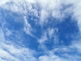 Blue sky background with clouds