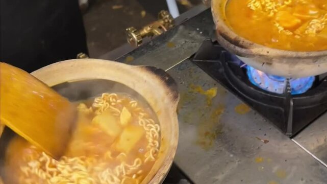 Claypot Maggi Curry Mee with Egg and Turmeric Flavor
