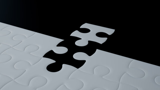 Striking Black Puzzle Piece Floating to Complete a White Jigsaw - Symbol of Integration and Solution