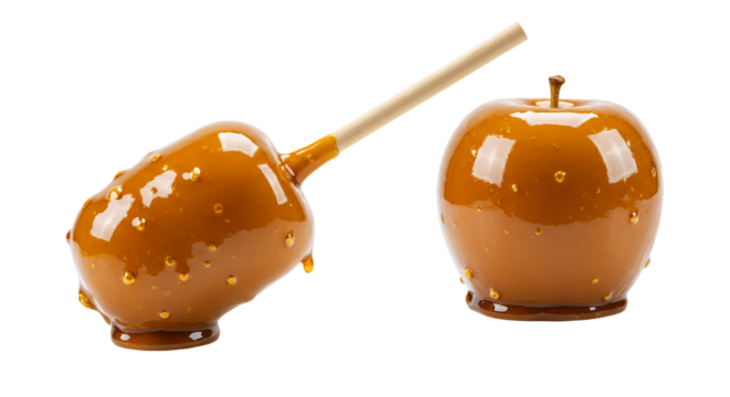 Two Caramel Apples on Sticks Against Transparent Background