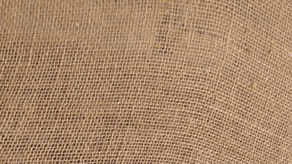 Natural linen texture as a background. Brown and Cream Canvas or rustic jute sackcloth woven fabric texture background. T