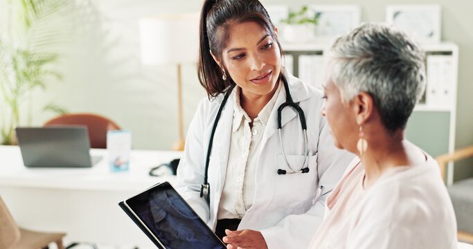 Doctor, senior woman and tablet for x ray results, lungs assessment and medical exam at hospital. Radiologist, elderly patient and online for chest scan, diagnosis and advice for healthcare treatment