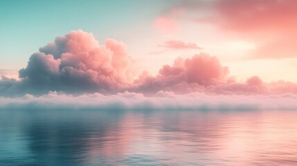Pastel pink and blue sunset clouds reflected in calm ocean water.