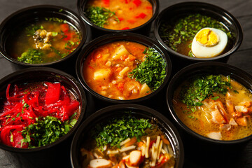 Business lunch in eco plastic container ready for delivery.Top view. Office Lunch boxes with food ready to go. Food takes away. Catering, brakfast.