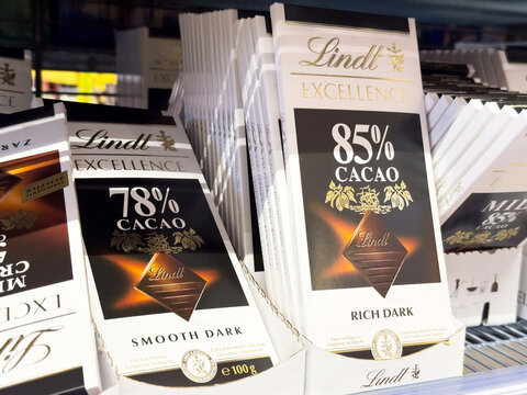 Variety of lindt dark chocolate bars with cacao percentage displayed