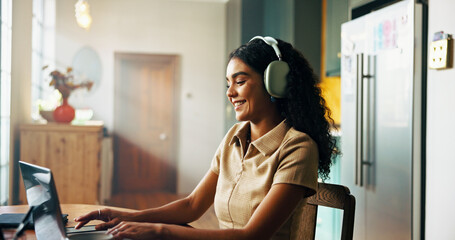 Headphones, laptop and woman in home typing with remote work for creative magazine agency with project. Audio tech, computer and critic editor streaming music, album or playlist for online review.