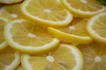 Fresh lemon slices pattern backgrond, close up 