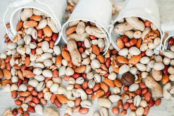 Assorted nuts for a background Almond, walnut,cashew, pistachios, hazelnuts, peanuts, Macadamia...