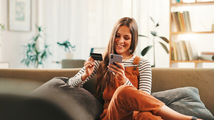 Happy, woman and phone with credit card at house for payment, online shopping and banking...