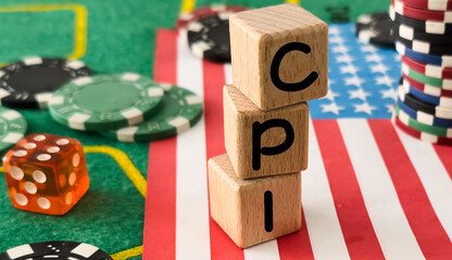 Word CPI on a wooden block. Consumer Price Index concept on dollar bills. Calculator Pen Business...