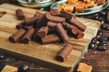 Assortment of sweet confectionery with chocolate candies and pralines. Children's holiday table with chocolate sweets