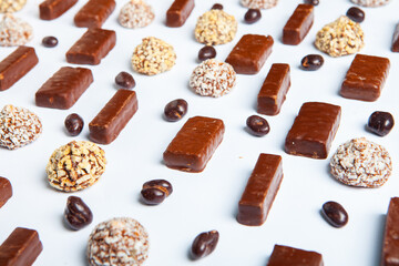 Assortment of sweet confectionery with chocolate candies and pralines. Children's holiday table with chocolate sweets