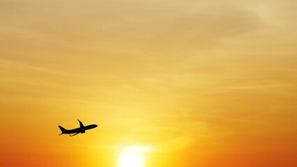 Airplane Silhouette at Sunset: An airplane silhouette is captured during a vibrant sunset, evoking feelings of travel, adventure, and freedom.