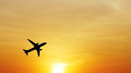Airplane Silhouette at Sunset: A majestic airplane silhouette gracefully ascends against a vibrant sunset backdrop, symbolizing travel, freedom, and new horizons.